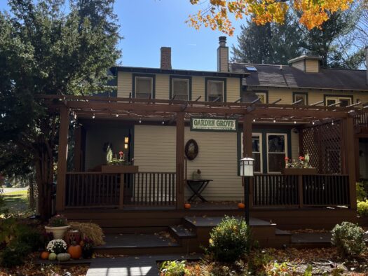 Garden Grove Inn Entrance during fall (blue skies and colorful trees)