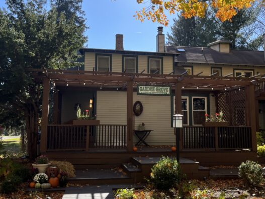 Garden Grove Inn Entrance during fall (blue skies and colorful trees)